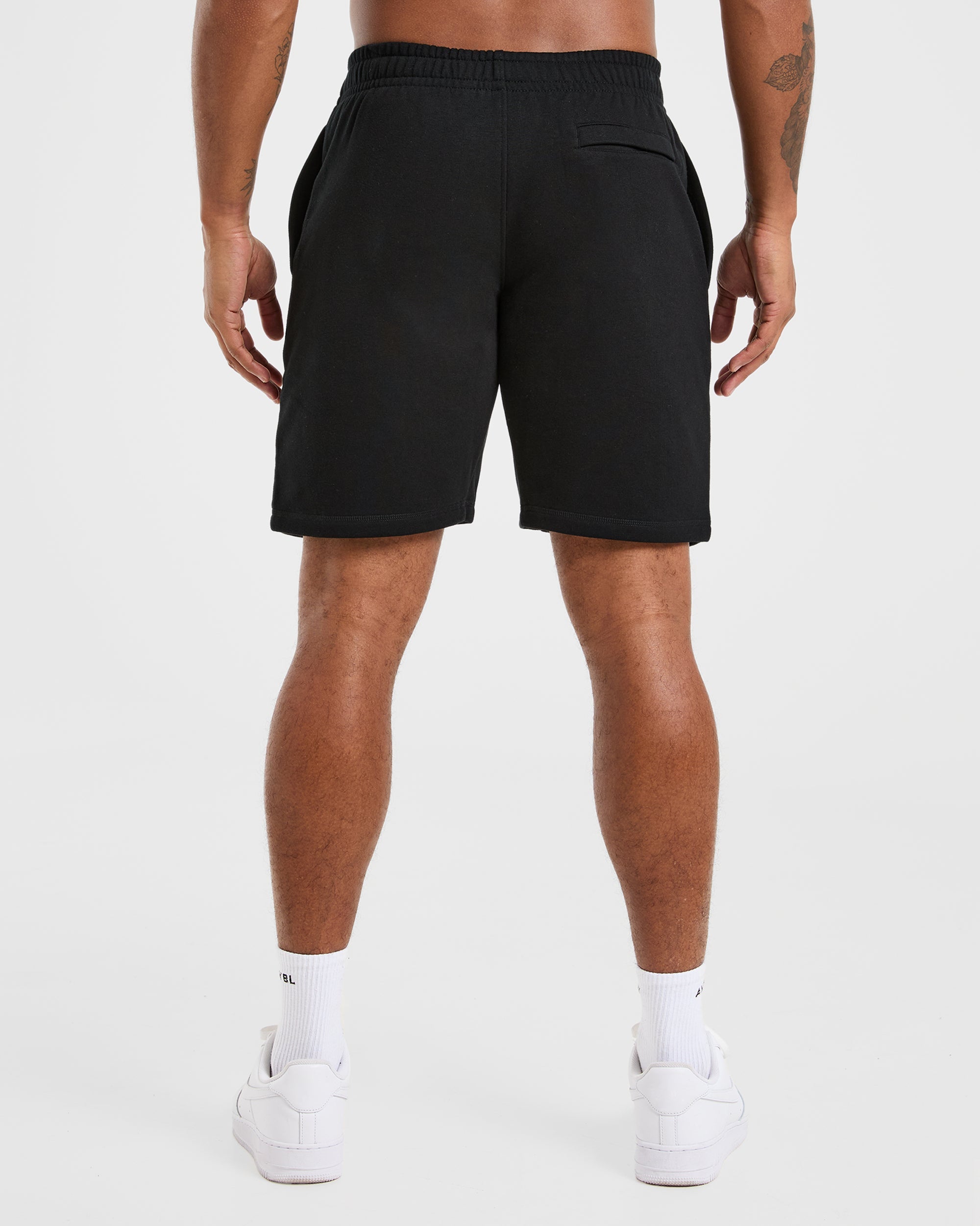 Pantalones cortos esenciales ligeros de 7" - Negro