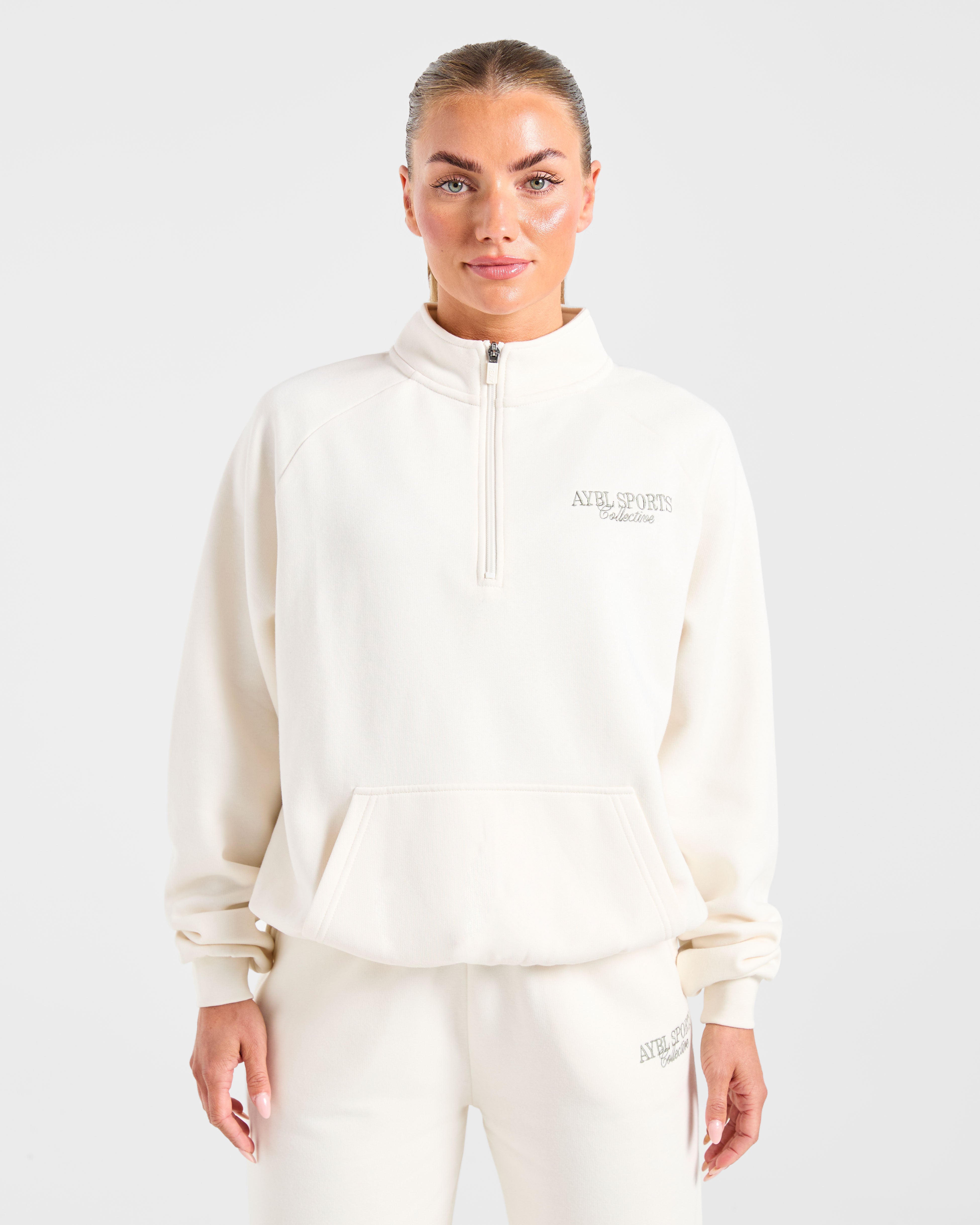 Pulóver Oversized de 1/4 de Cierre Sports Collective - Blanco Oficina/Verde