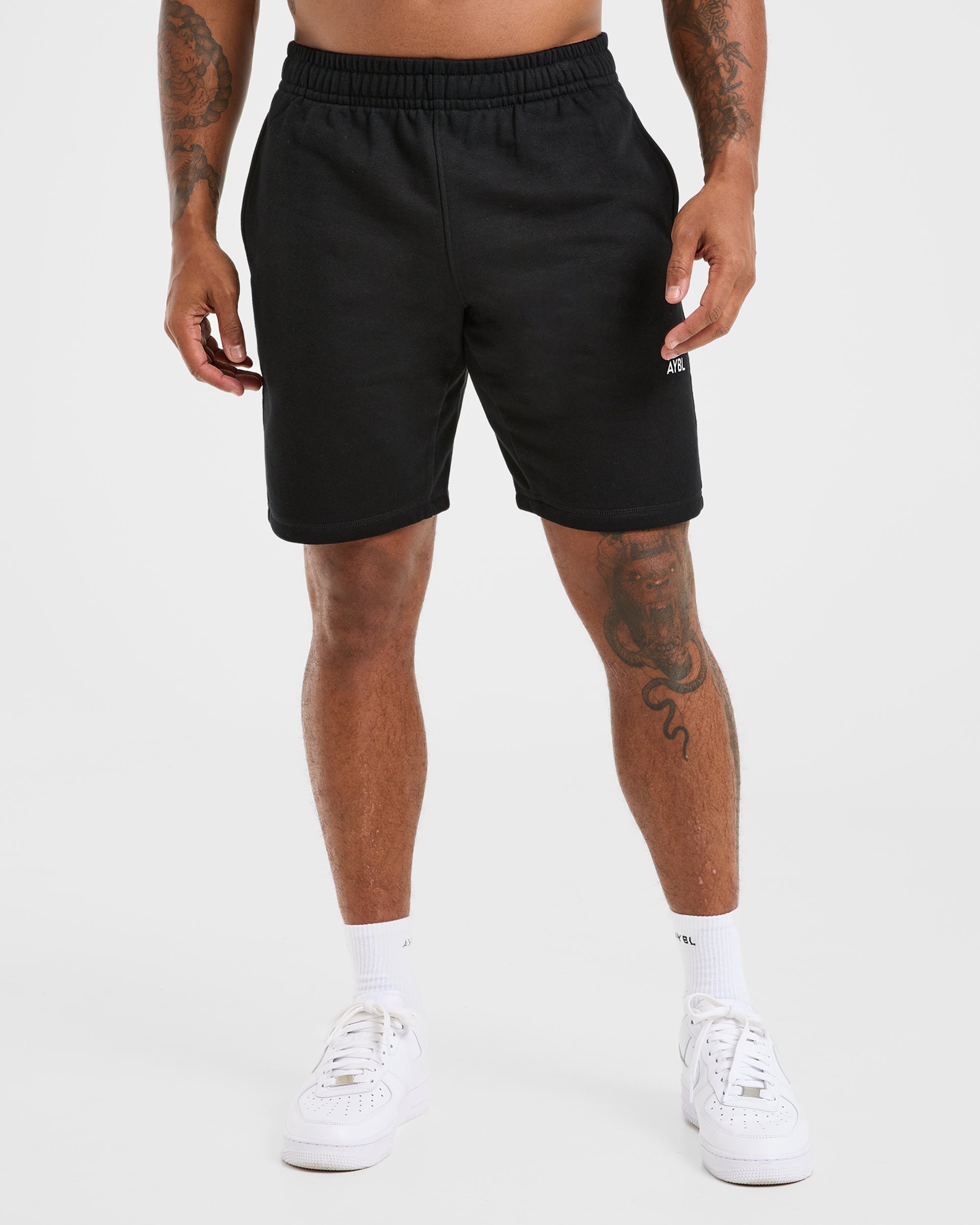 Pantalones cortos esenciales ligeros de 7" - Negro