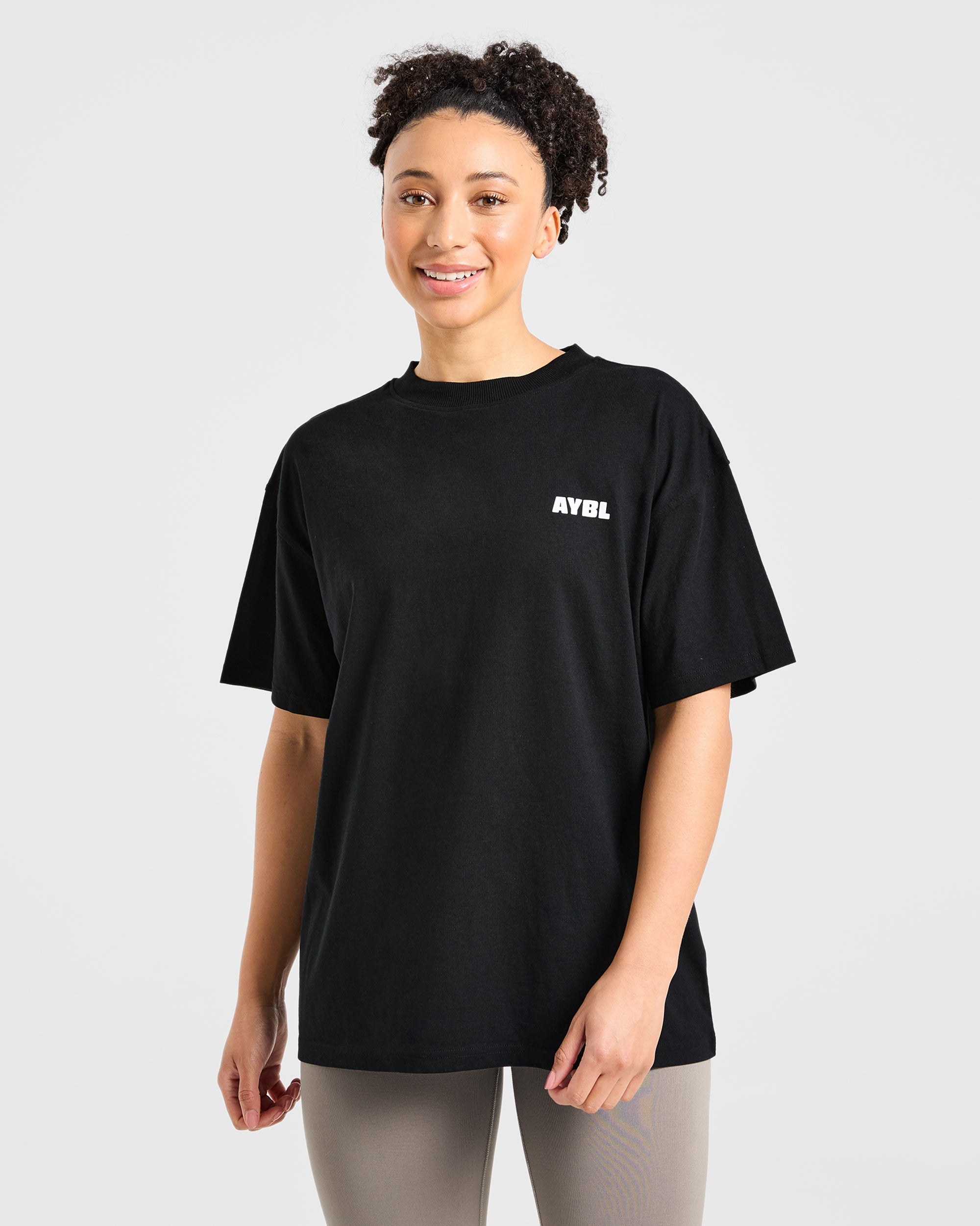 Camiseta Oversized con Estampado de Ondas Focadas - Negro