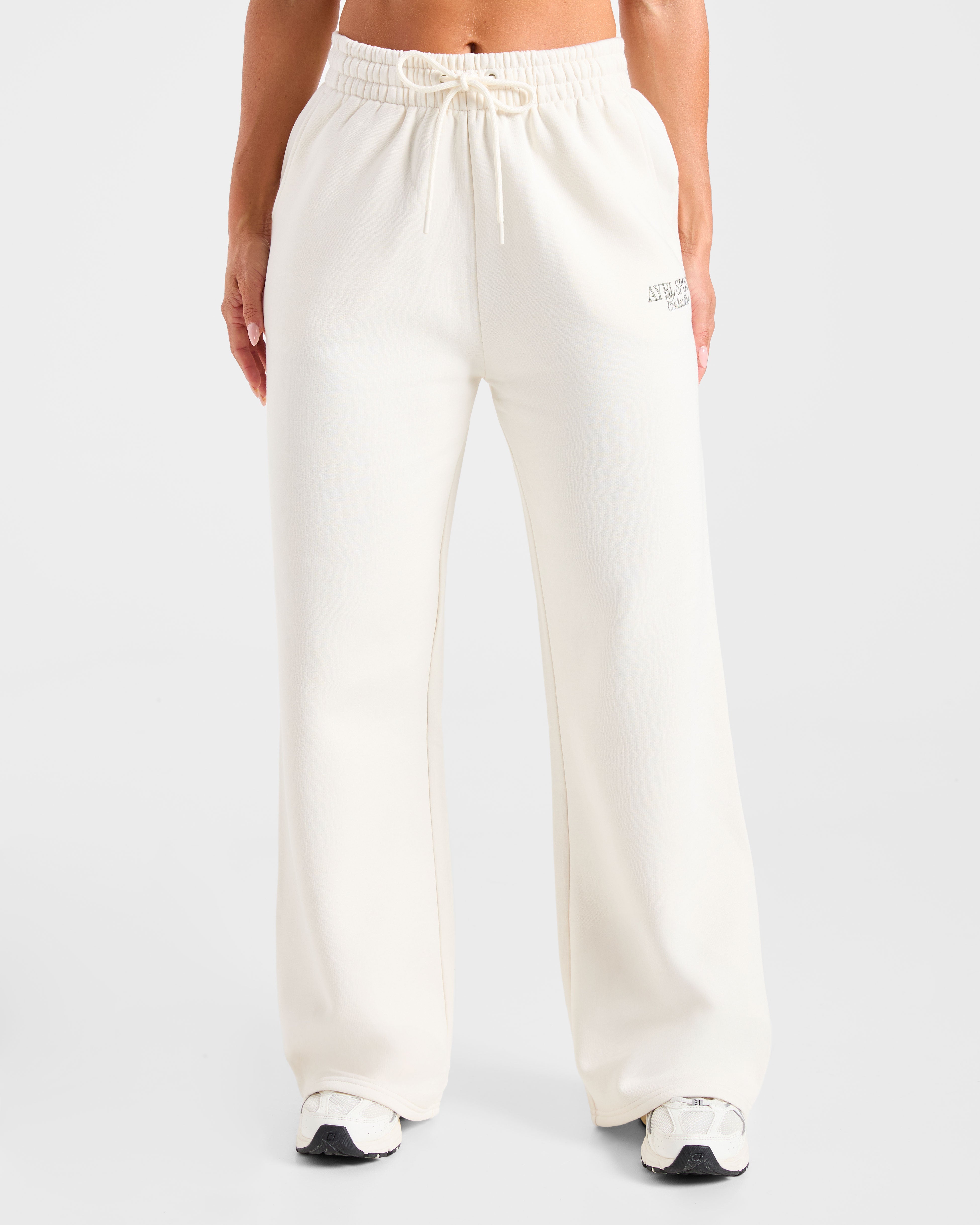 Pantalones Jogger de Pierna Recta y Corte Amplio de Sports Collective - Blanco Ofuscado/Verde