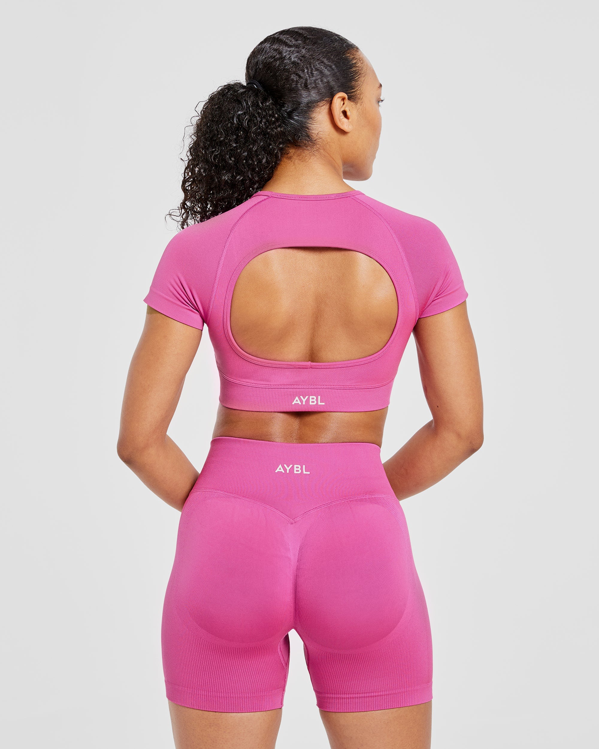 Top Corto Sin Costuras Adapt - Rosa