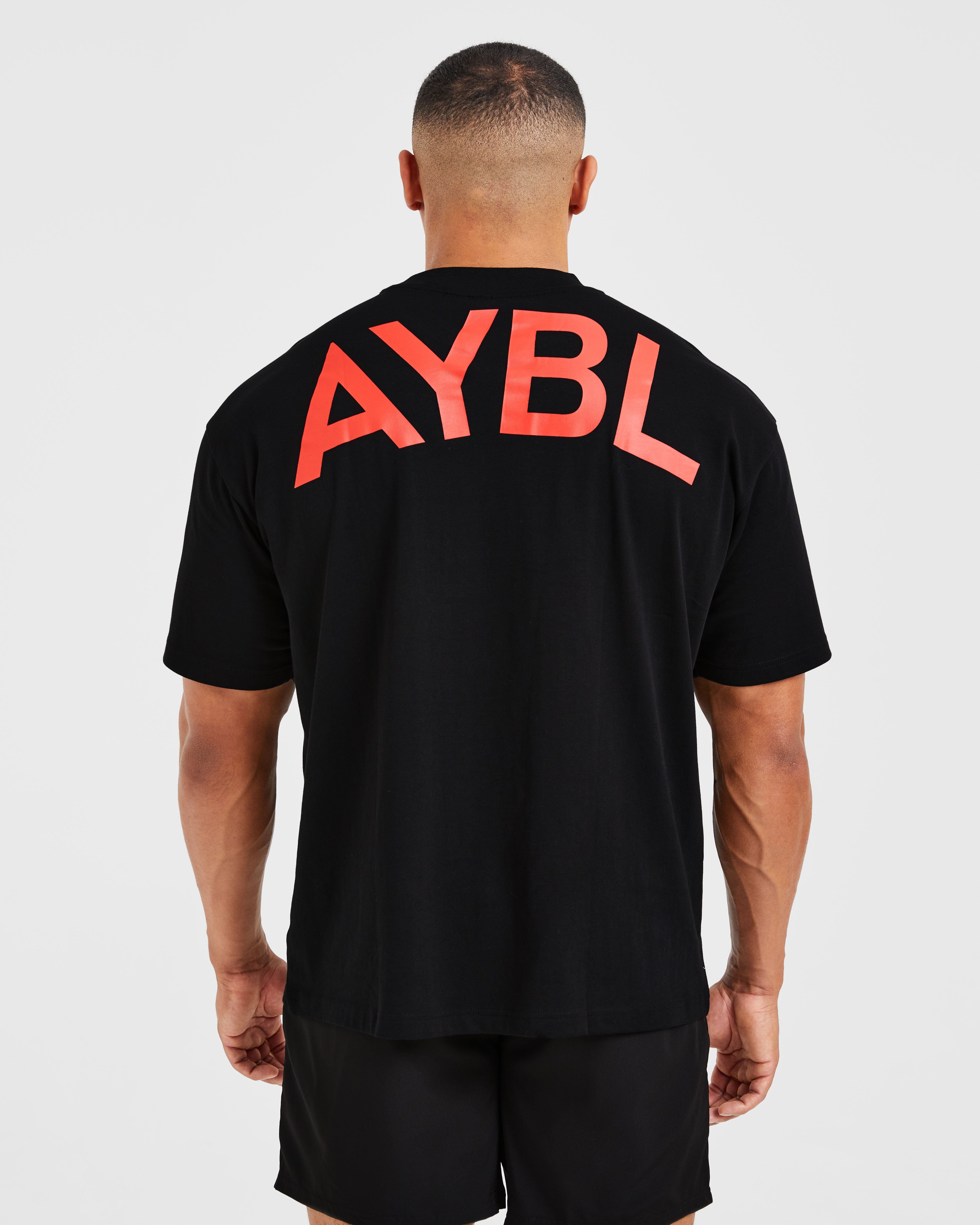 Camiseta Oversized Esencial - Negro/Rojo