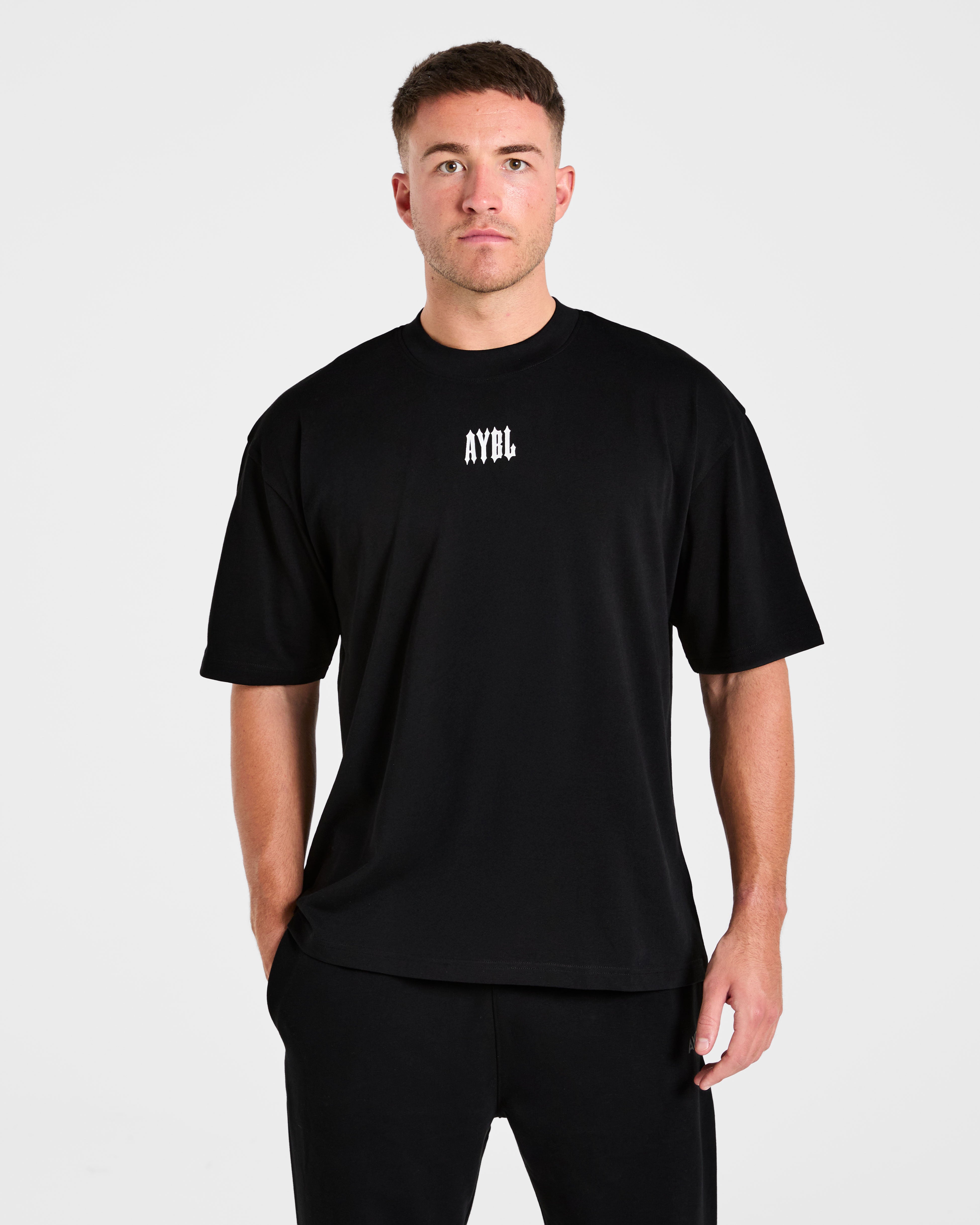 Camiseta Oversized Caza Tus Objetivos - Negro