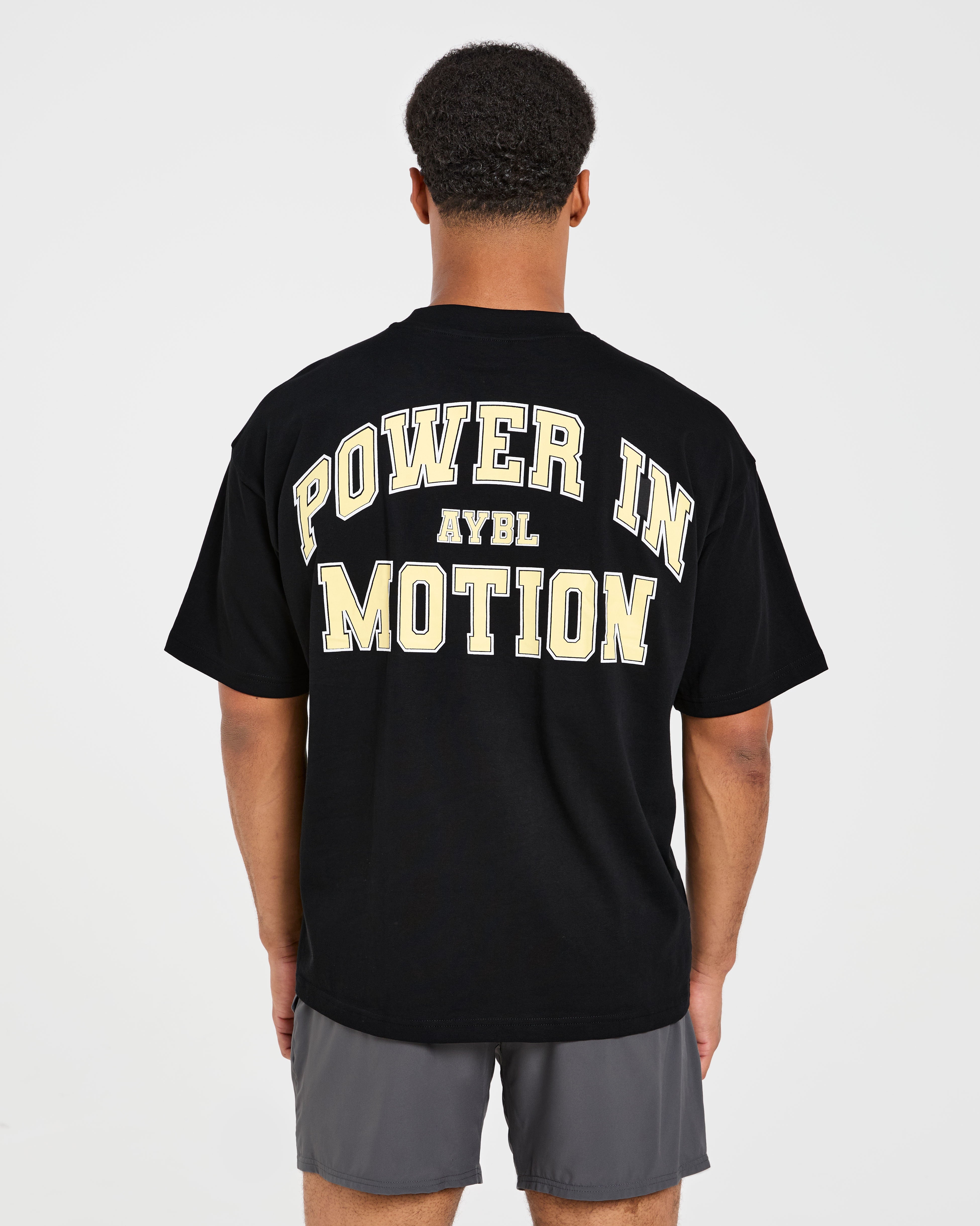 Camiseta Oversized Power In Motion - Negro/Amarillo