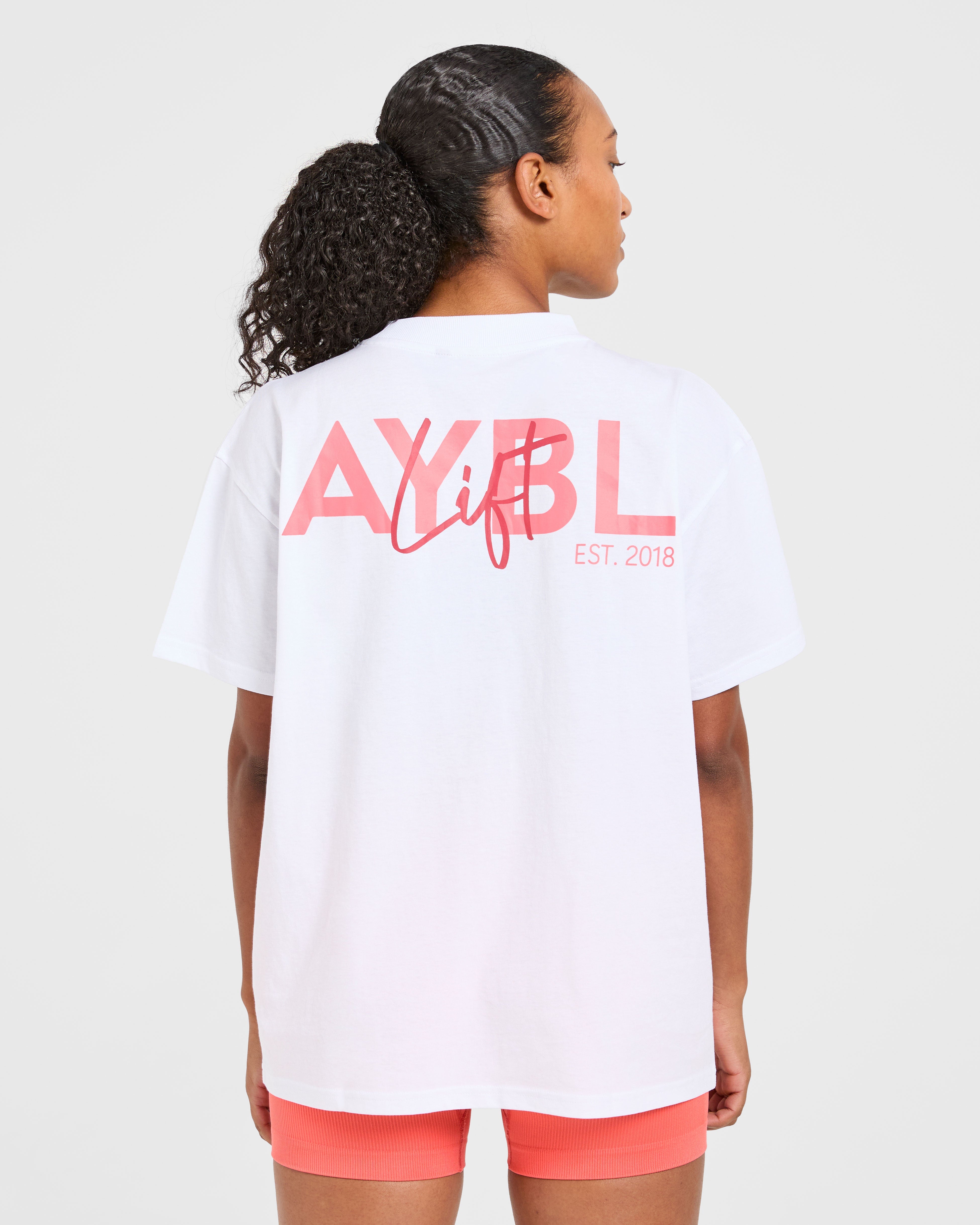 Camiseta Oversized con Estampado Lift - Blanco/Coral Melocotón