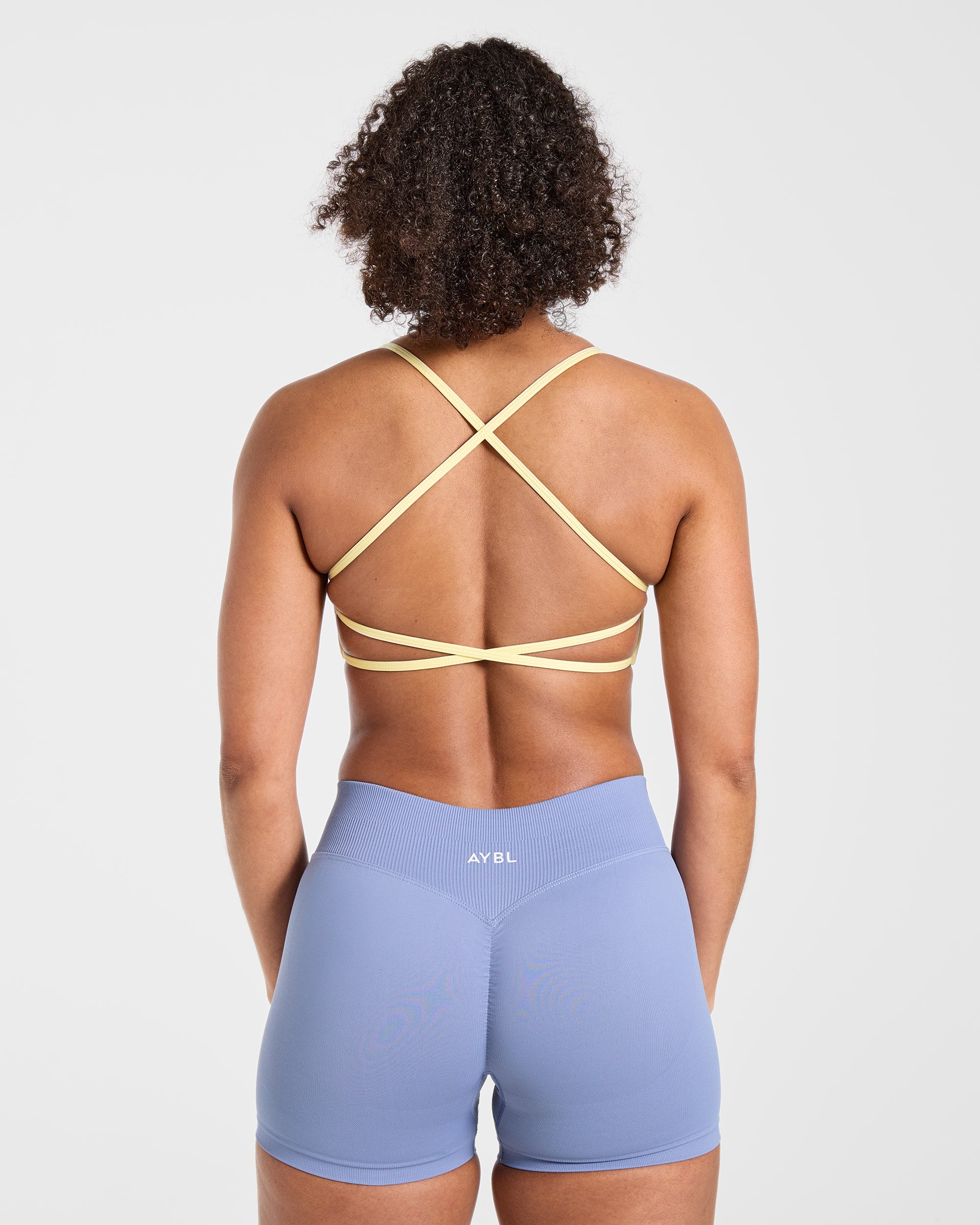 Sports Bra Essential de Espalda Cruzada - Amarillo