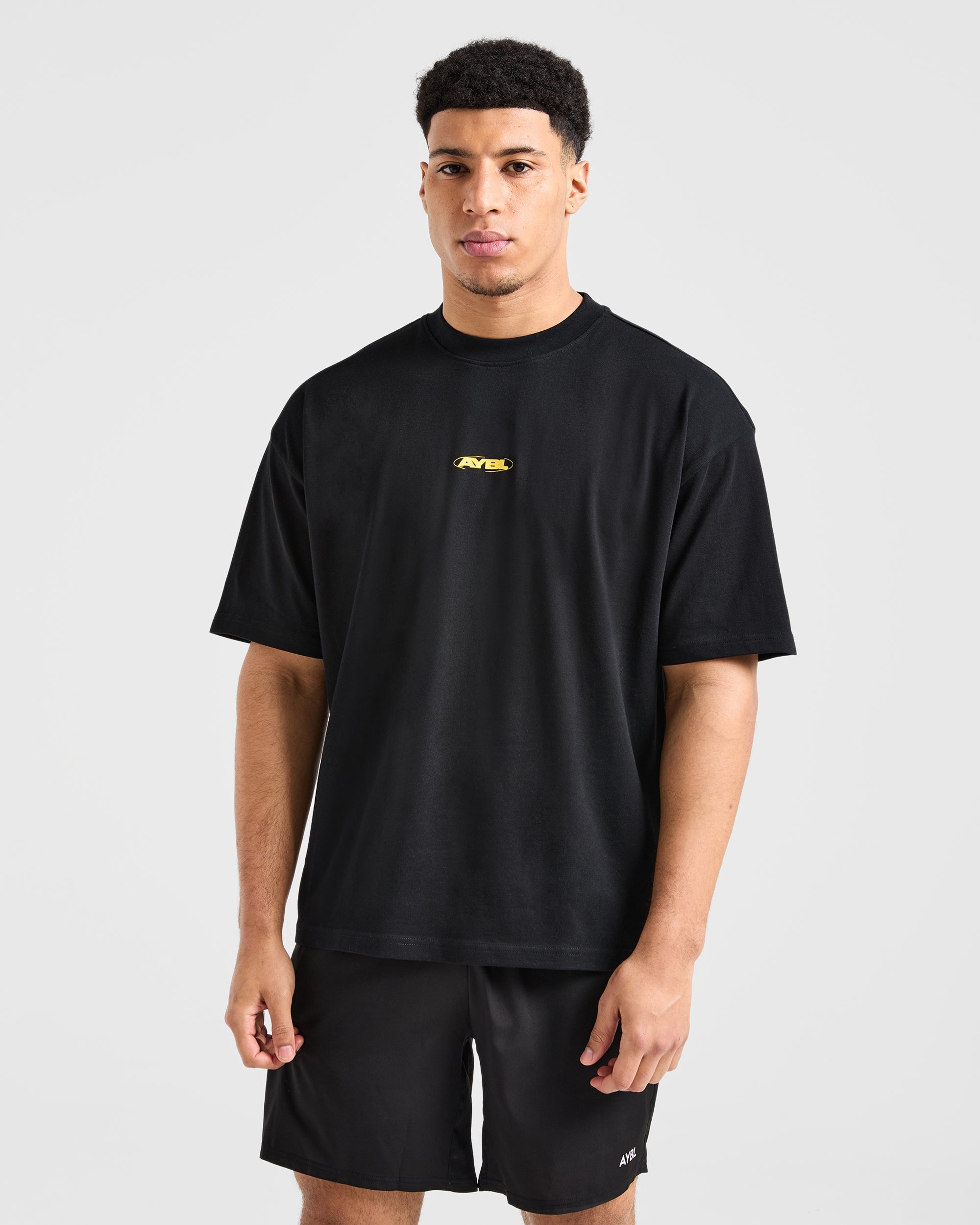 Camiseta Oversized Orbit - Negro/Amarillo