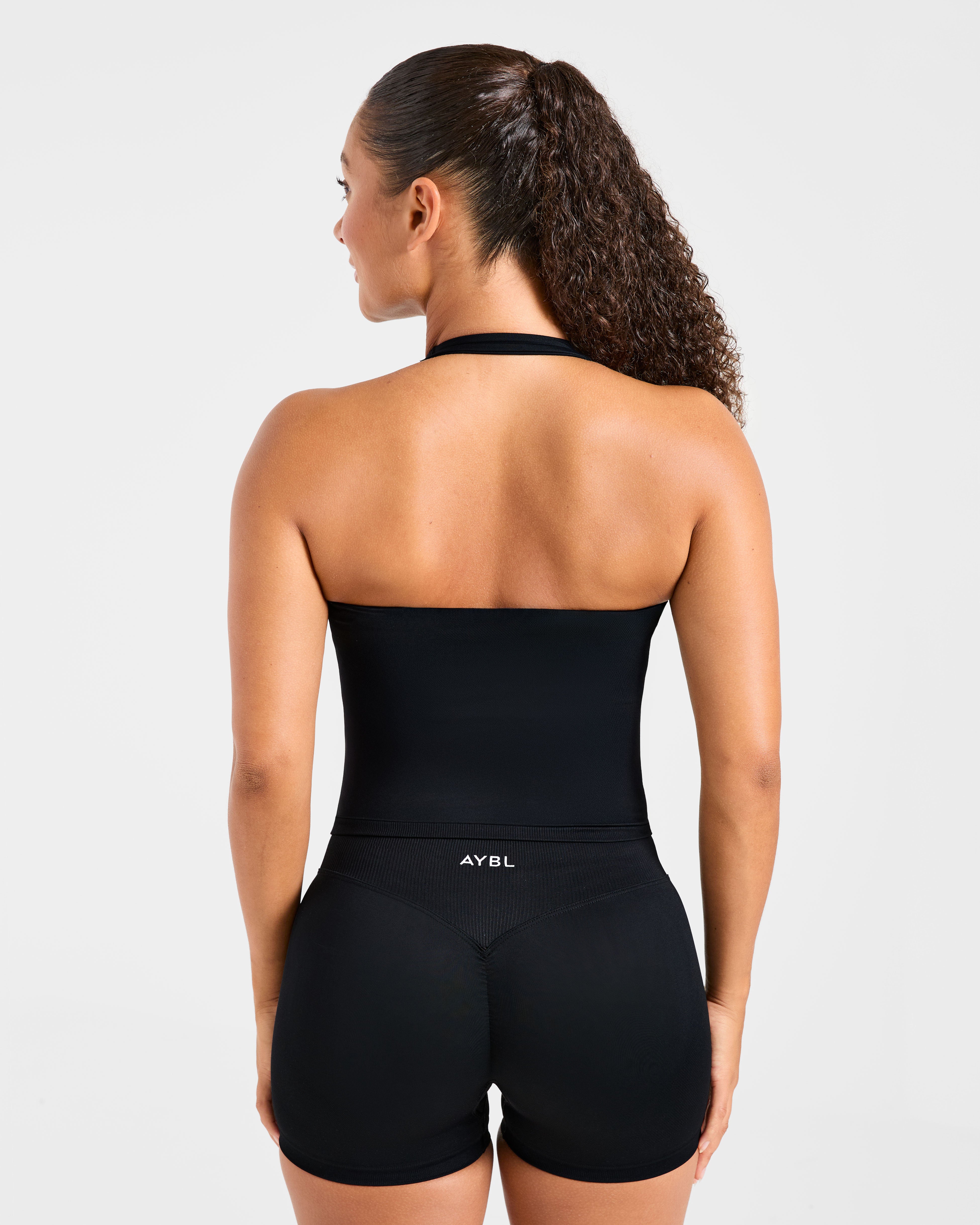 Mejora el top sin costuras tipo halter negro