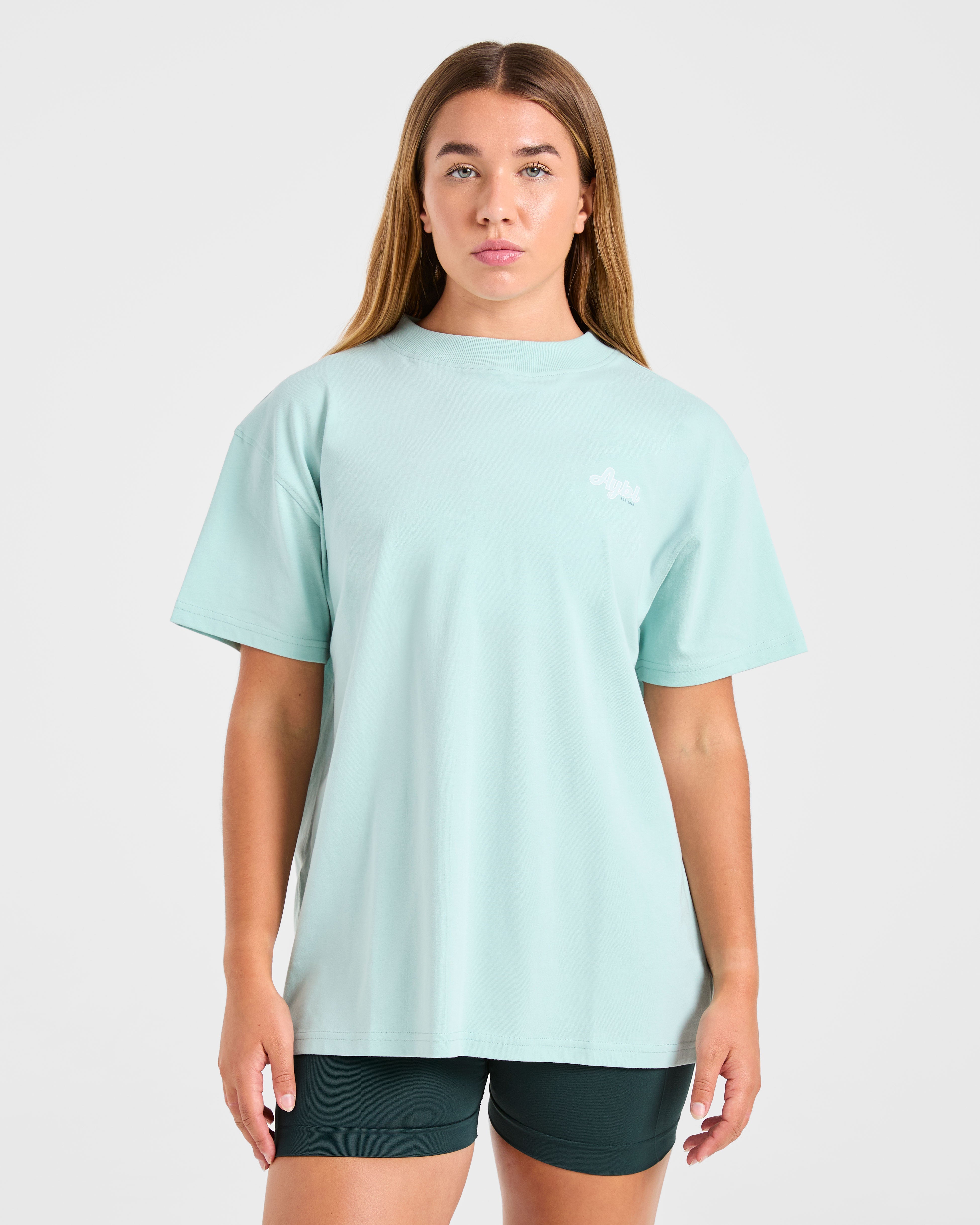 Camiseta Oversized de Bienestar Deportivo - Verde Aqua
