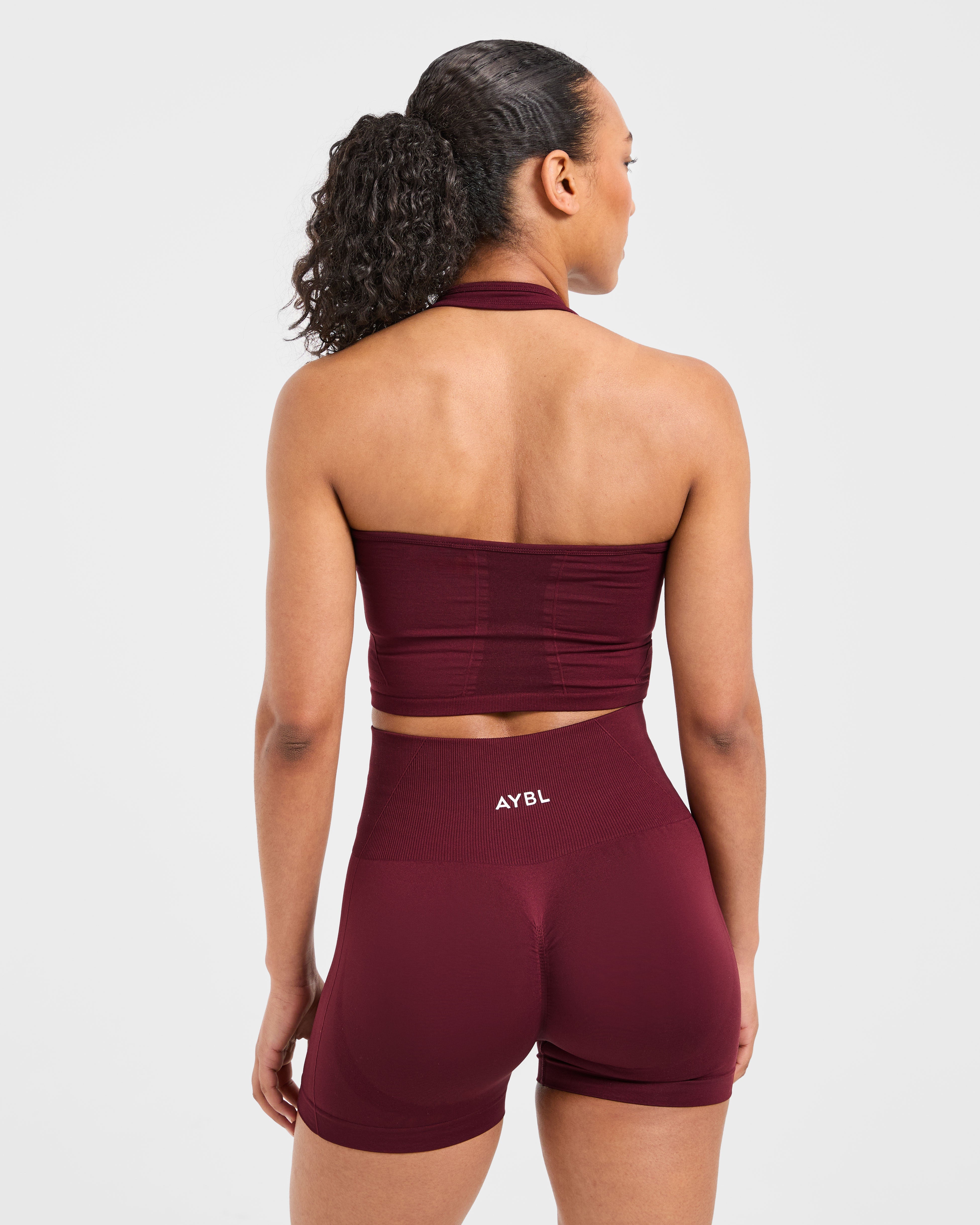 Top Corto Sin Costuras con Cuello Halter Empoderador - Rojo Vino