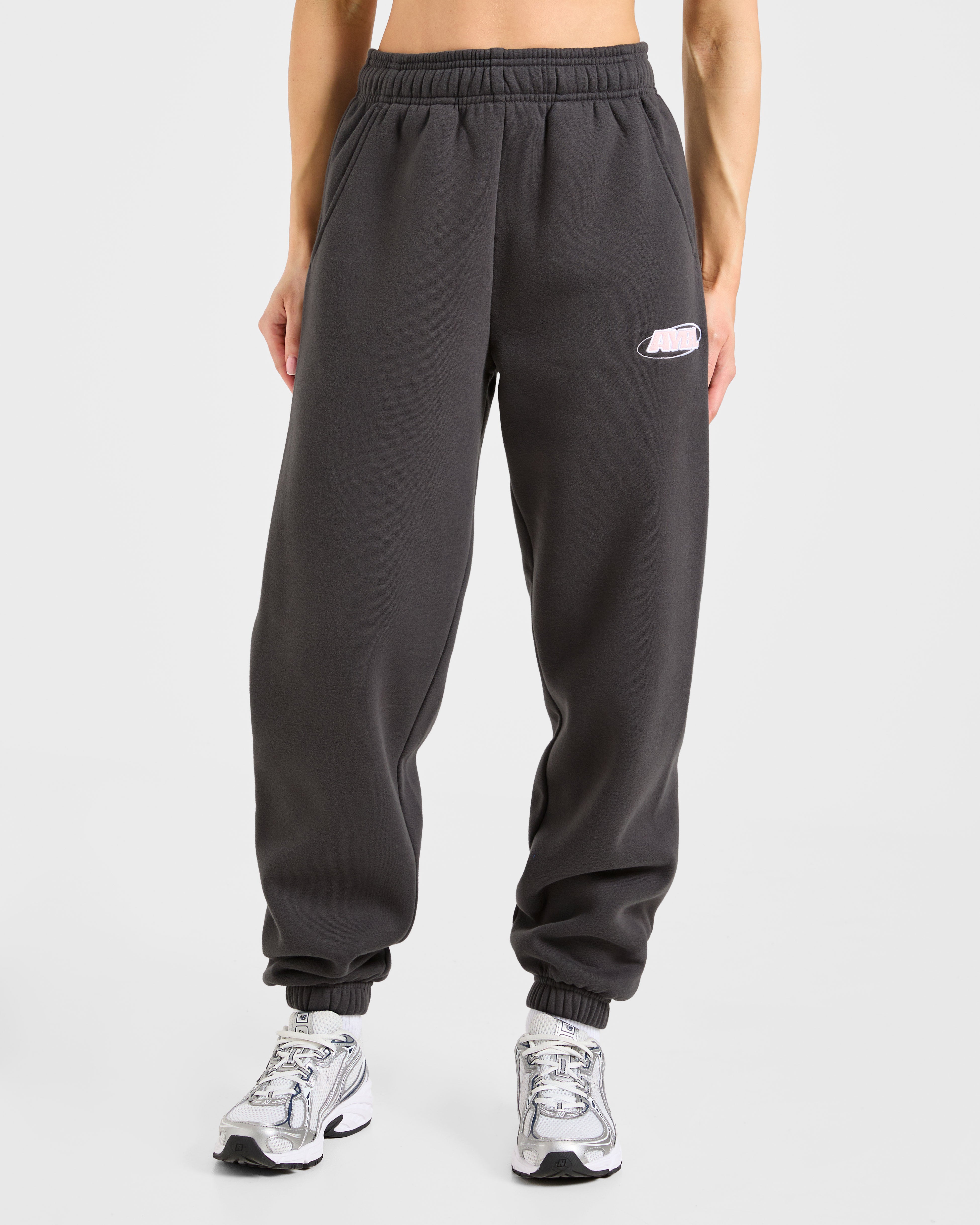 Pantalones Jogger Oversized Essentials Deportivos - Gris Carbón/Rosa