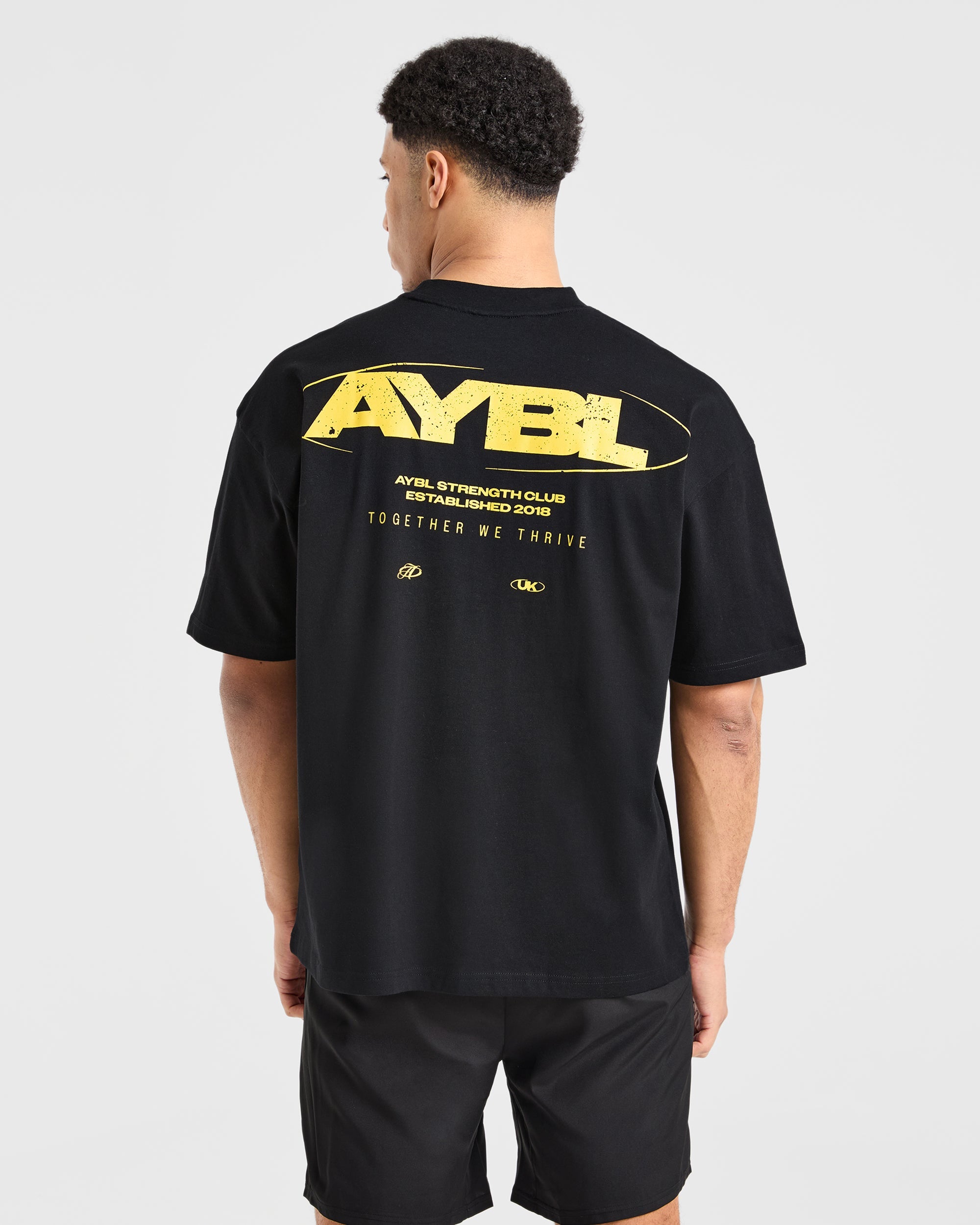 Camiseta Oversized Orbit - Negro/Amarillo