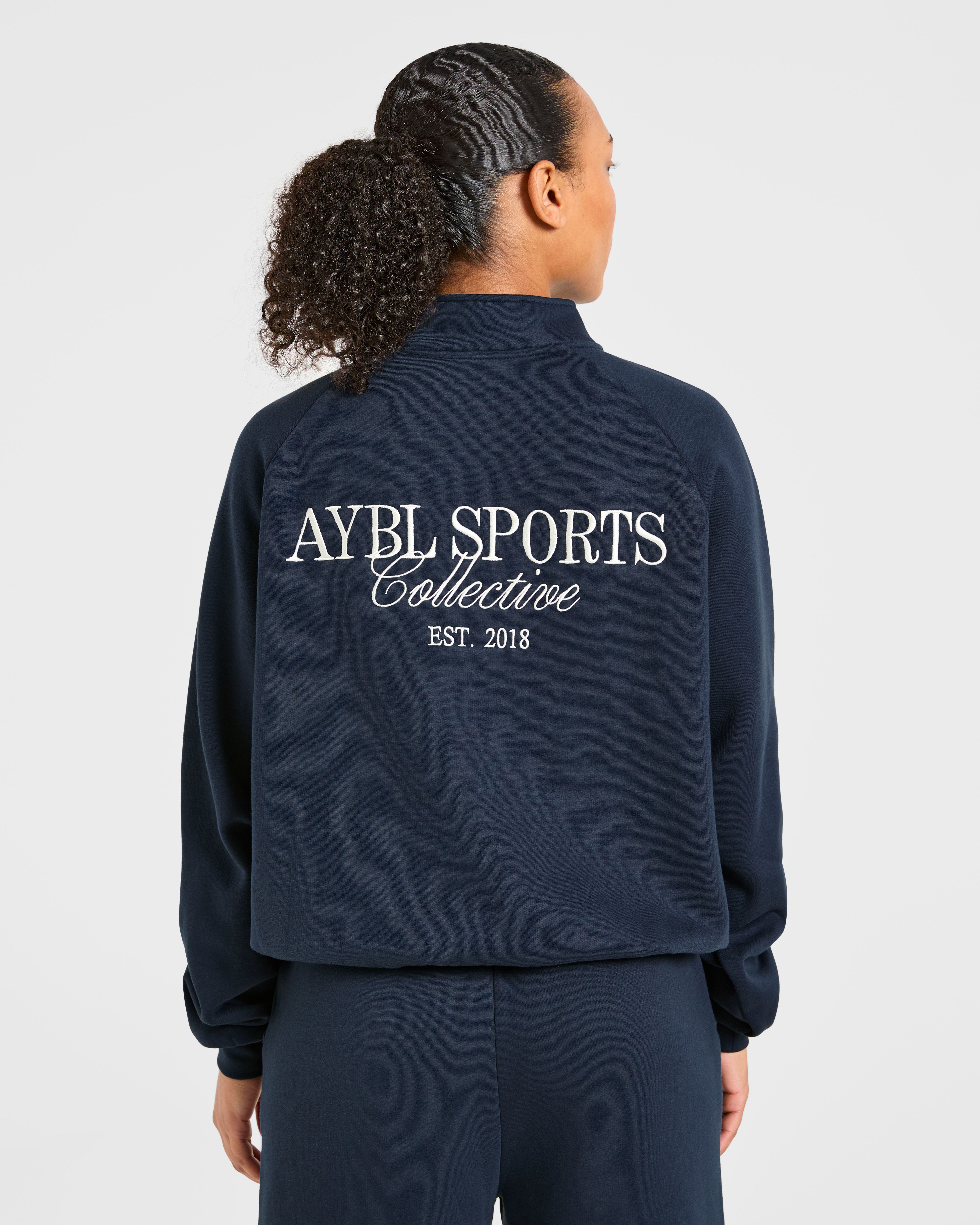 Deportes Colectivo Pulóver Oversized de 1/4 Cremallera - Azul Marino
