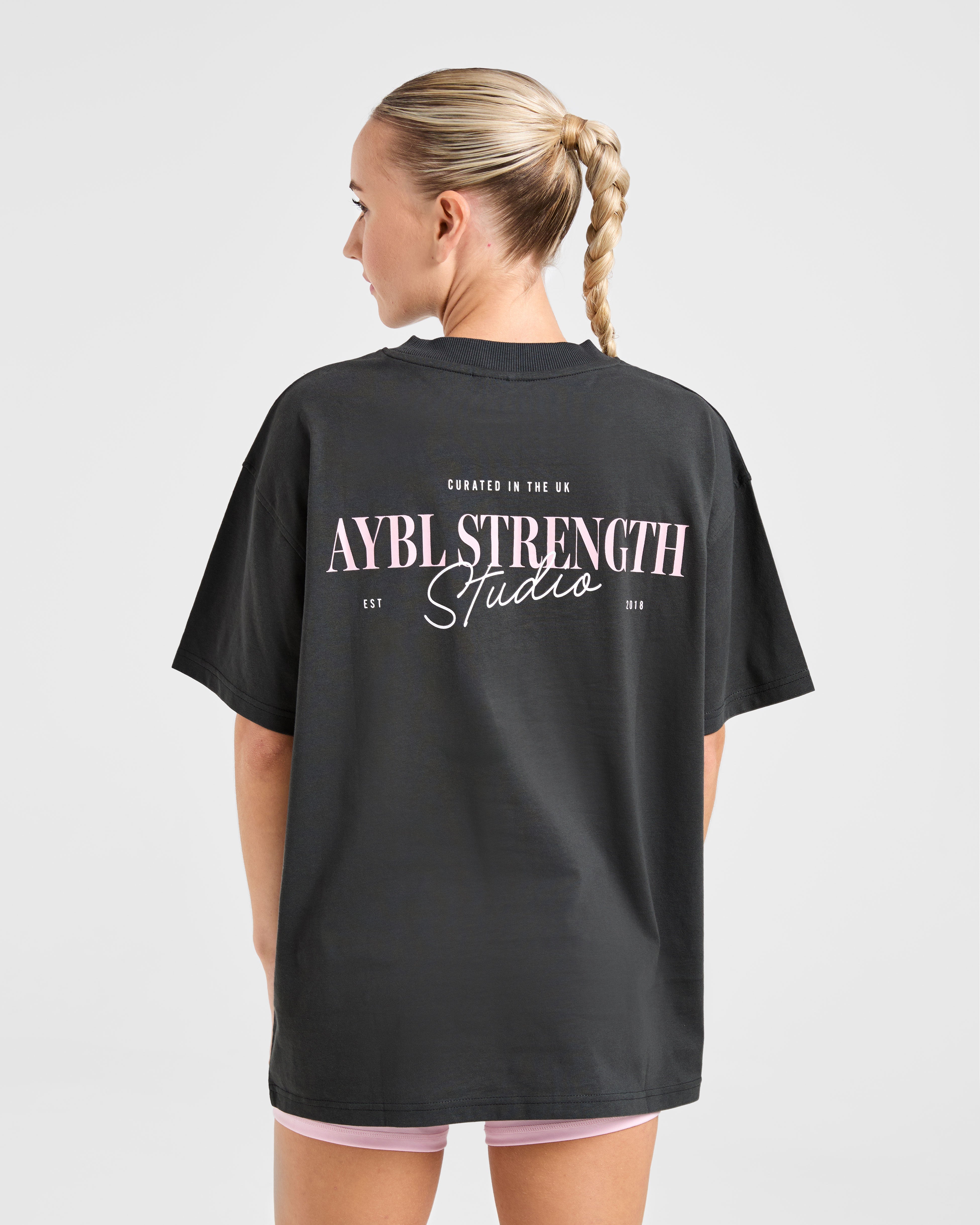 Camiseta Oversized Strength Studio AYBL - Gris carbón/Rosa