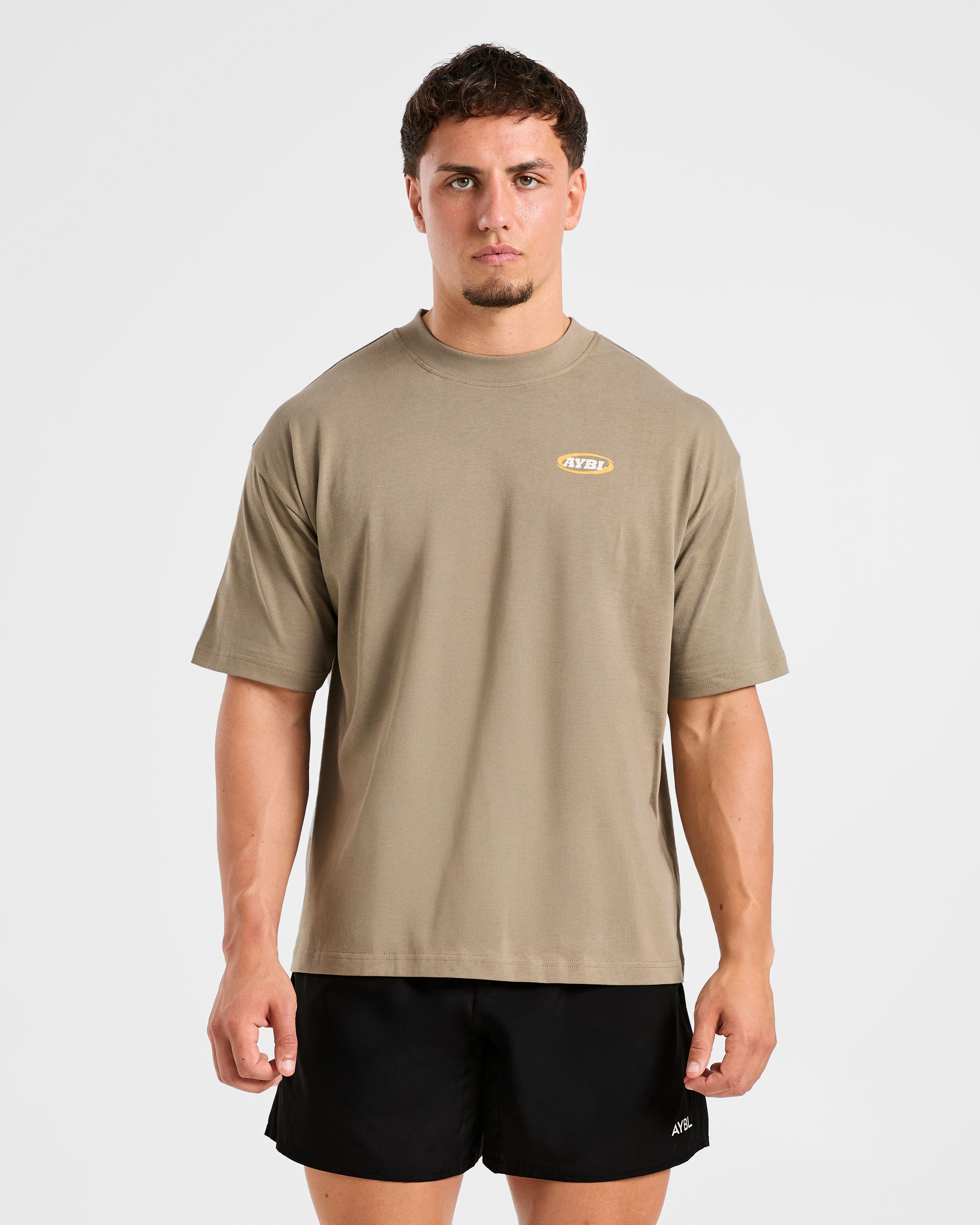 Camiseta Oversized con Estilo de Atletismo - Arena Oliva