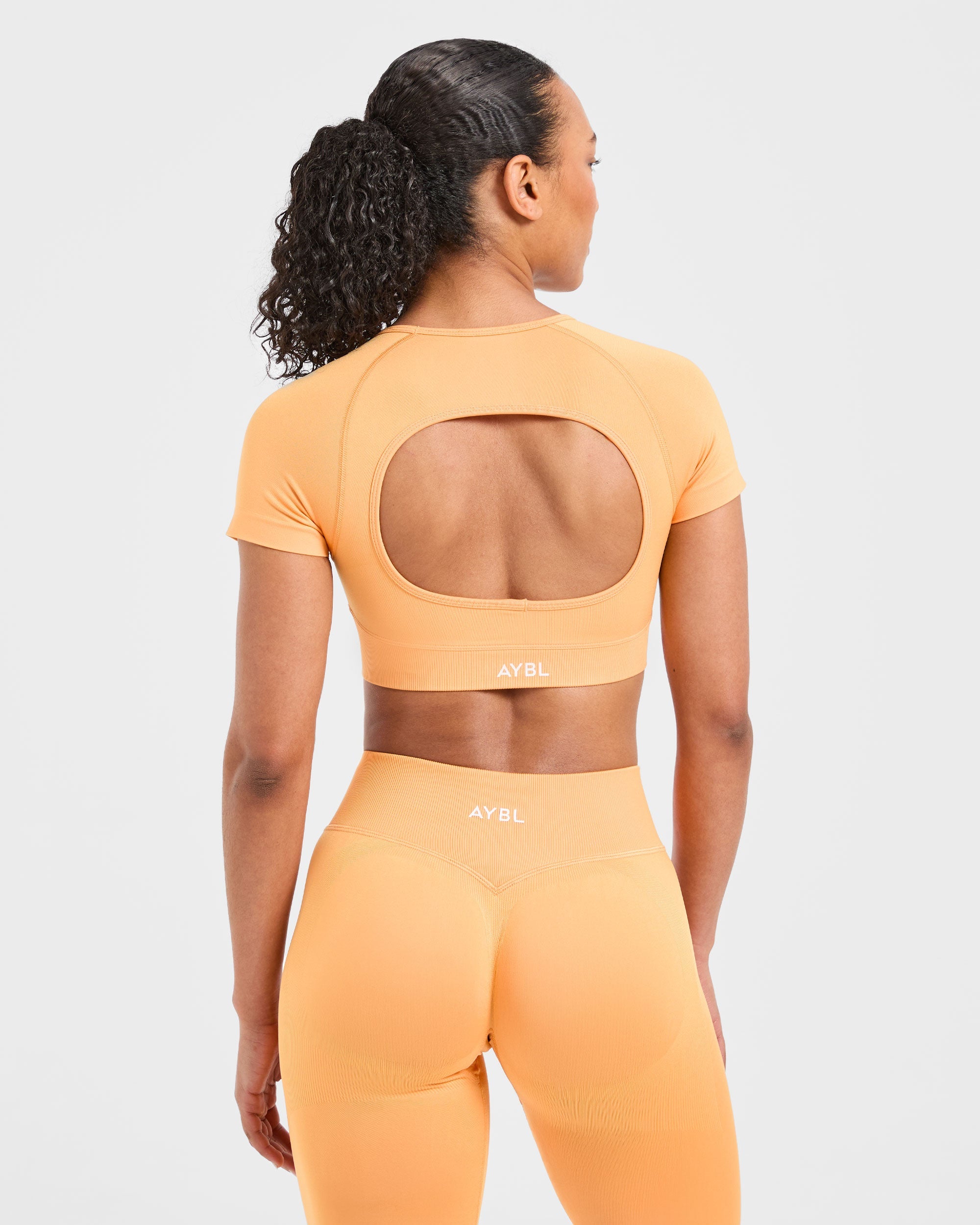 Top Corto Sin Costuras Adapt - Naranja Brillante