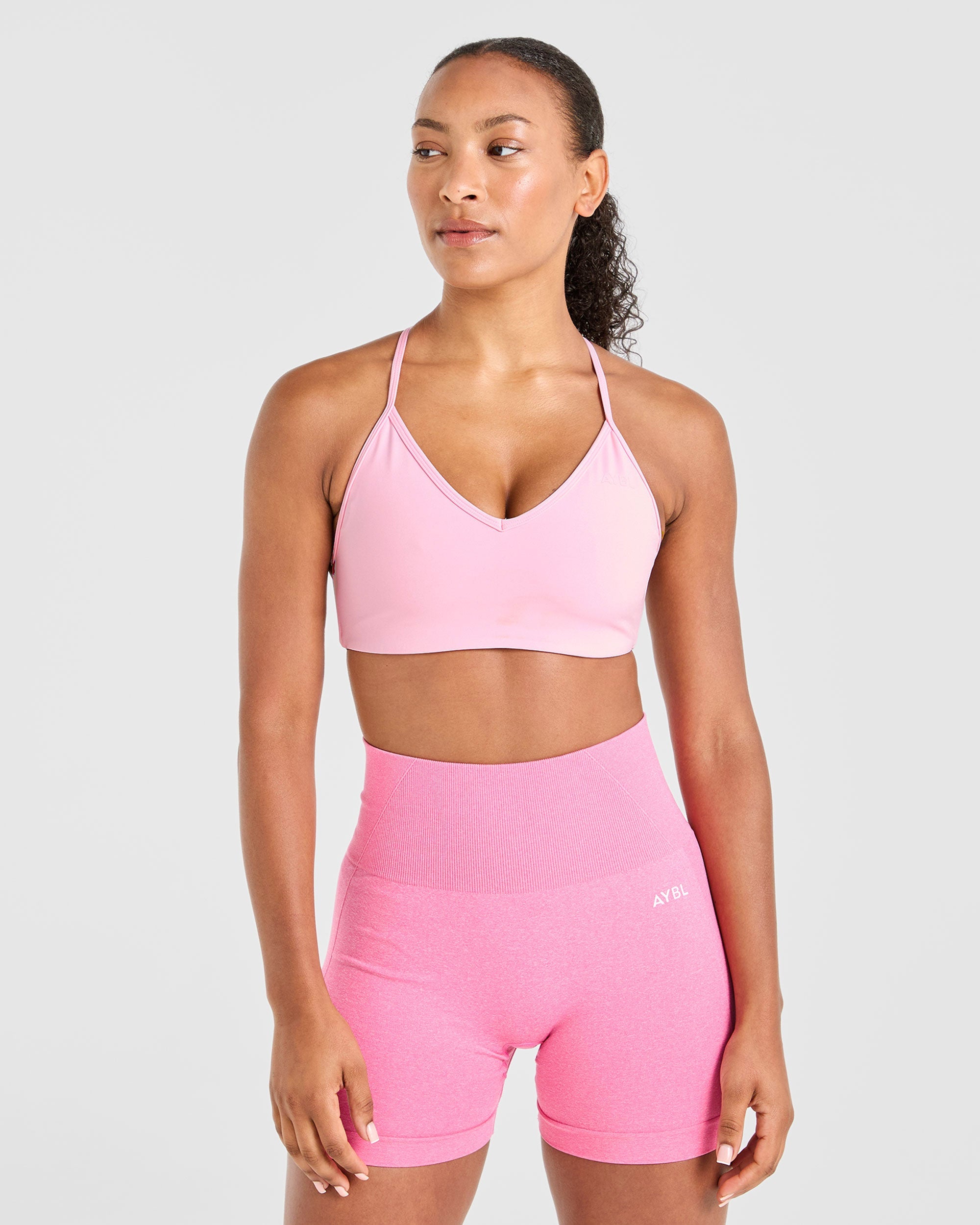 Sports Bra Essential con Espalda Cruzada - Rosa Bebé
