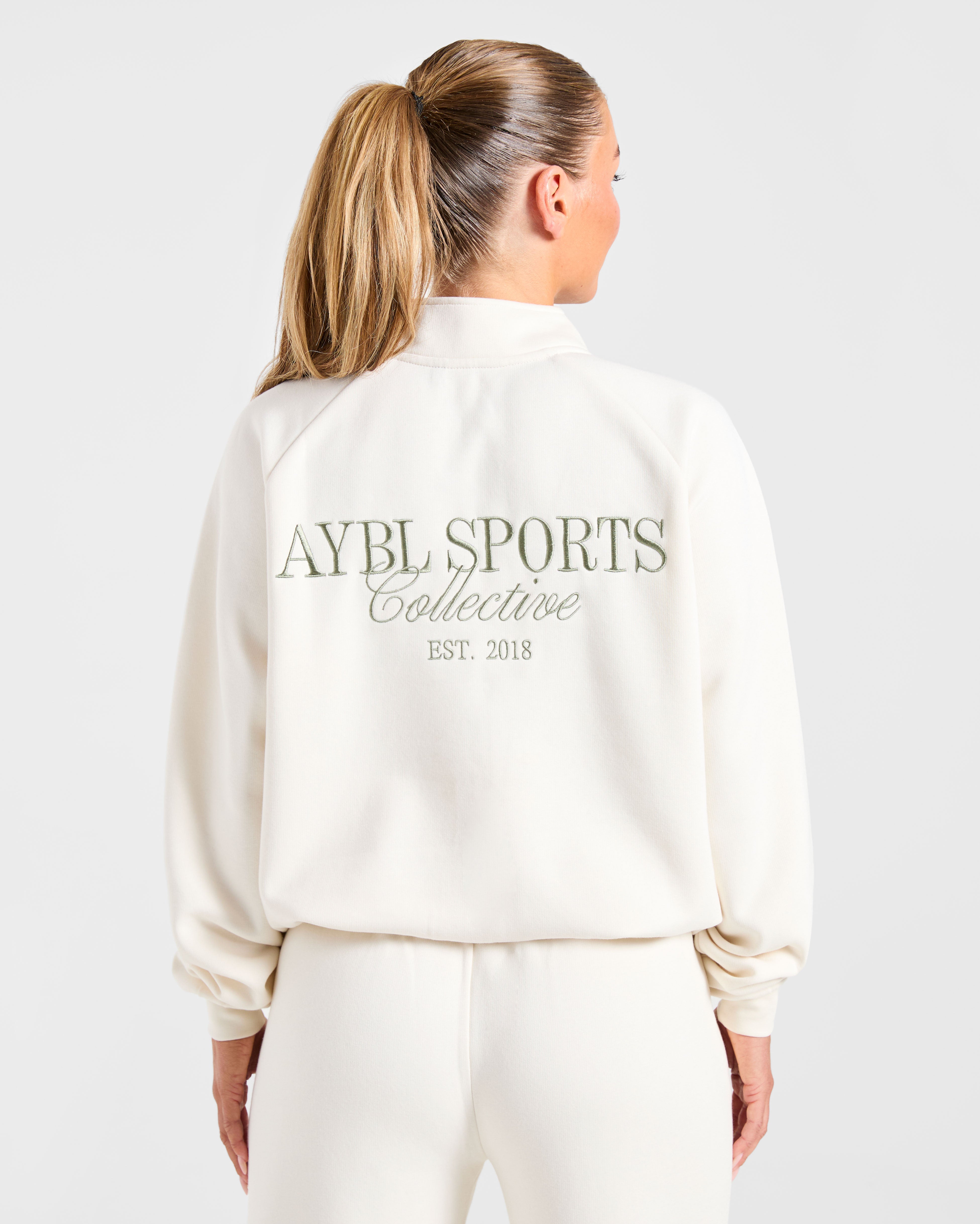 Pulóver Oversized de 1/4 de Cierre Sports Collective - Blanco Oficina/Verde
